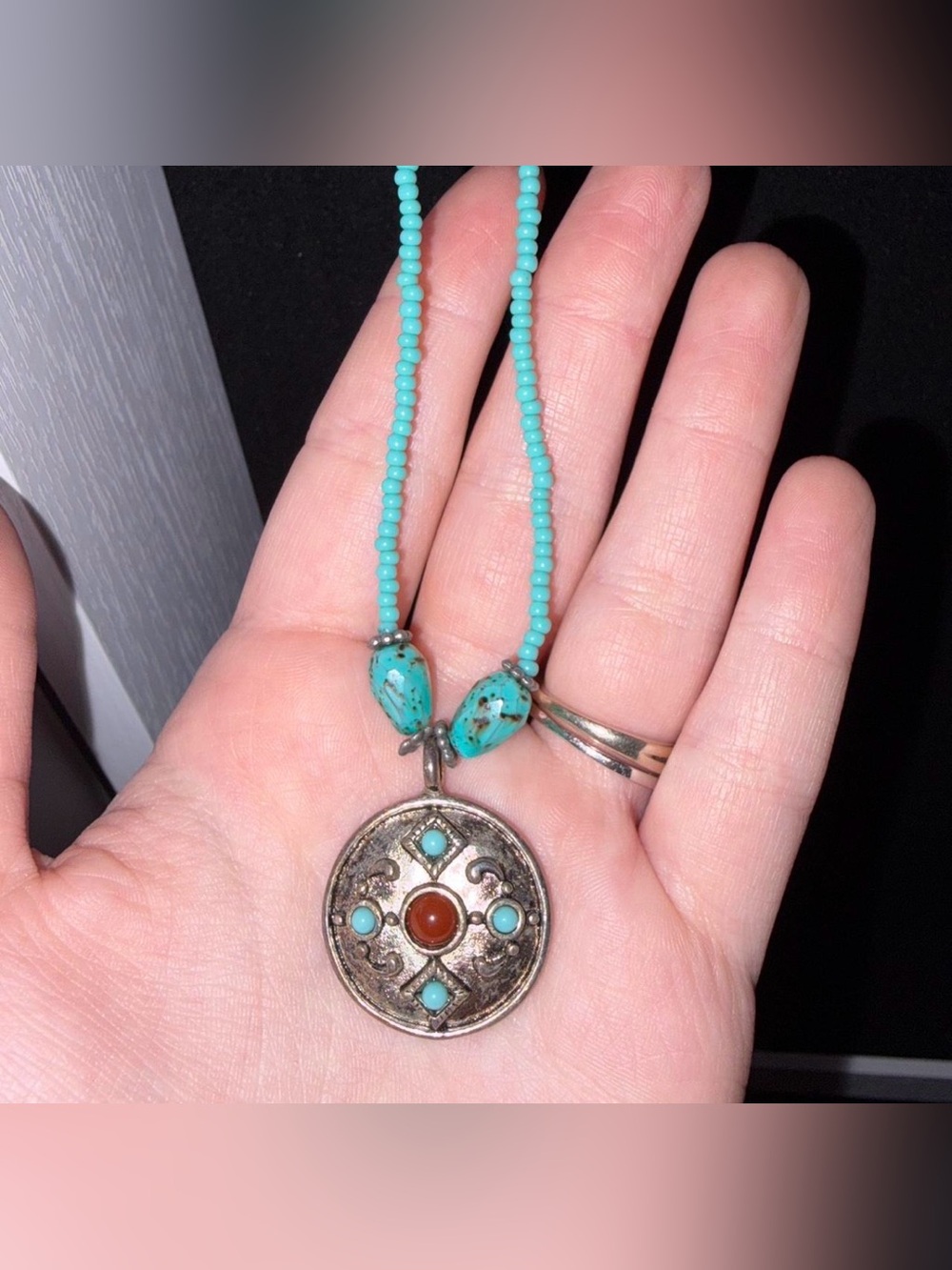 Handmade turquoise and silver beaded necklace with pendant